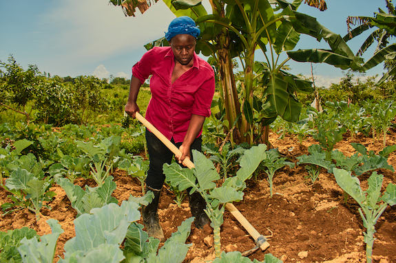 Rachel Lutomia working in her garden