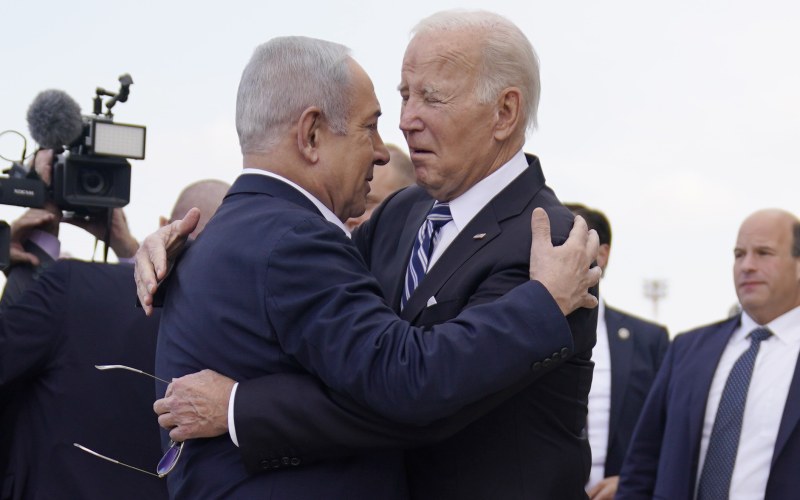 President Joe Biden is greeted by Israeli Prime Minister Benjamin Netanyahu after arriving at Ben Gurion International Airport, Wednesday, Oct. 18, 2023, in Tel Aviv.