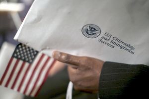 US Citizenship and Immigration Services envelop and US flag