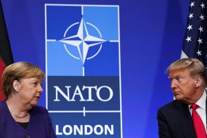 Angela Merkel and Donald Trump face eachother at the NATO Summit. 