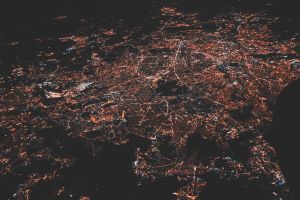 Aerial view of a city lit up at night