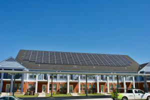 Solar panels on the roof of a multifamily residential building