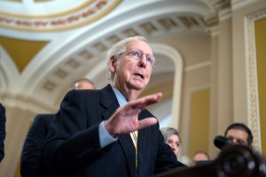 Senate Minority Leader Mitch McConnell speaks to reporters at the Capitol in Washington