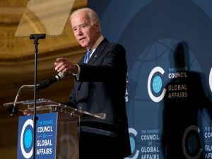 Joe Biden speaks at a podium