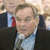 Richard M. Daley talks into a microphone at an event