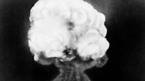 the mushroom cloud of the first atomic explosion at Trinity Test Site