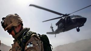 Blackhawk helicopter taking off from an operating base.