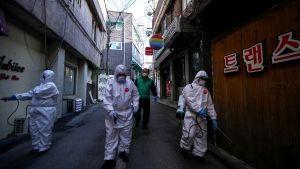 Cleaning workers disinfect the streets and public places of the Itaewon Multicultural District in Seoul, South Korea on May 12, 2020.