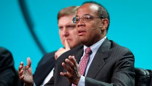 John W. Rogers, Jr. speaking during a panel discussion at a conference.