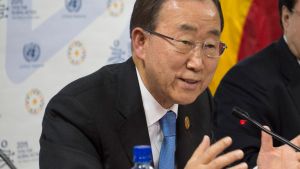 Photo of a man speaking into a microphone during the SG Press Conference