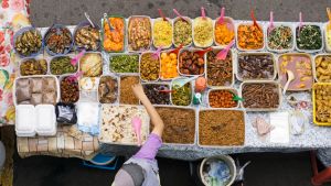 Top view of falconer at street food bazaar in Malaysia 