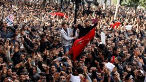 A large group of people protest in Tunisia