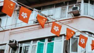 Flags of Hong Kong and China hung side-by-side in the street