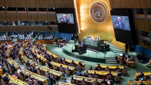 A large group of people listen to President Biden speak at the United Nations