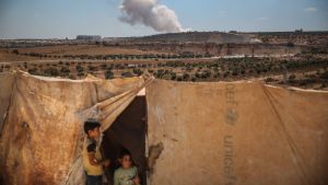 smoke with children in foreground