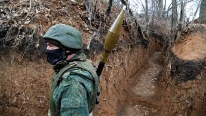 A militant of the self-proclaimed Luhansk People's Republic is seen at fighting positions in Luhansk Region