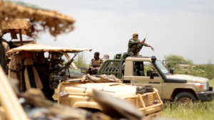 Malian armed forces on military trucks.