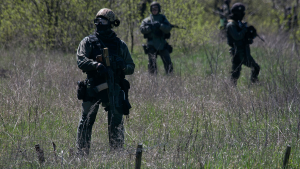 Ukrainian soldiers stand near the Kramatorsk airport in eastern Ukraine.