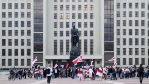 People holding flags gather to protest elections in Belarus