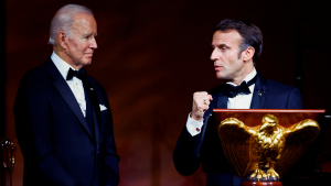 President Biden listens to President Macron's speech at a White House State Dinner on December 1, 2022.