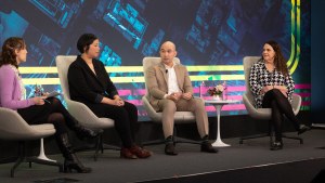 Four panelist on stage at the Pritzker Forum on Global Cities