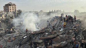 Palestinians look for survivors following Israeli airstrike in Nusseirat refugee camp, Gaza Strip on October 31, 2023.