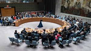 Members of the United Nations Security Council applaud after passing a cease-fire resolution in Gaza 