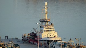 an aid ship at a port in Cyprus