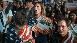 People gather to demand the release of hostages held by Hamas during a demonstration at Times Square