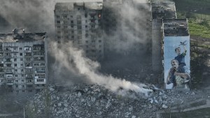  Smoke rises from a building in Bakhmut