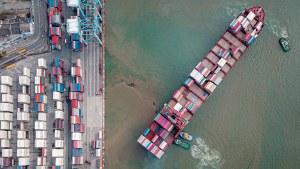 a container ship near a dock