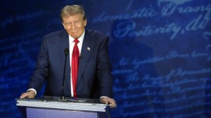 Former President Donald Trump smiles during the presidential debate