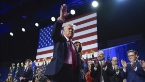 Donald Trump waves at his election night party