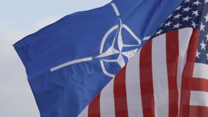 NATO and US flags wave in the wind