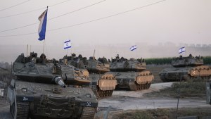 Israeli tanks head towards the Gaza Strip border